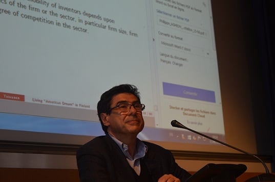 Philippe Aghion at the SIOE conference.